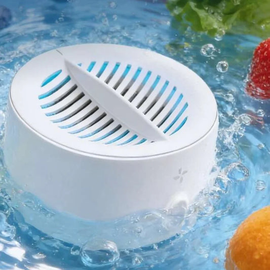 PuriBreeze puck running in a bowl of water with fruit