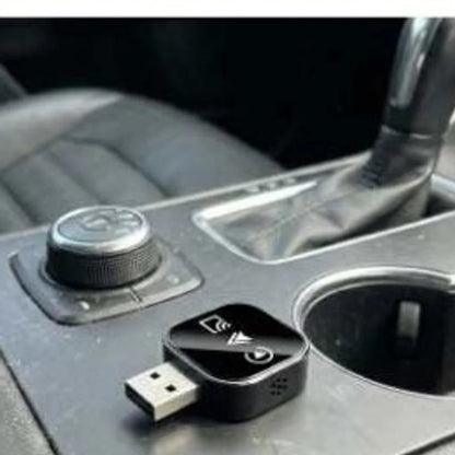 The adapter seated in the centre console USB port