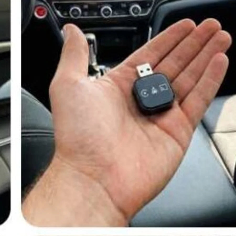 The adapter resting in an open palm for scale