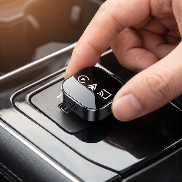Hand holding the compact adapter